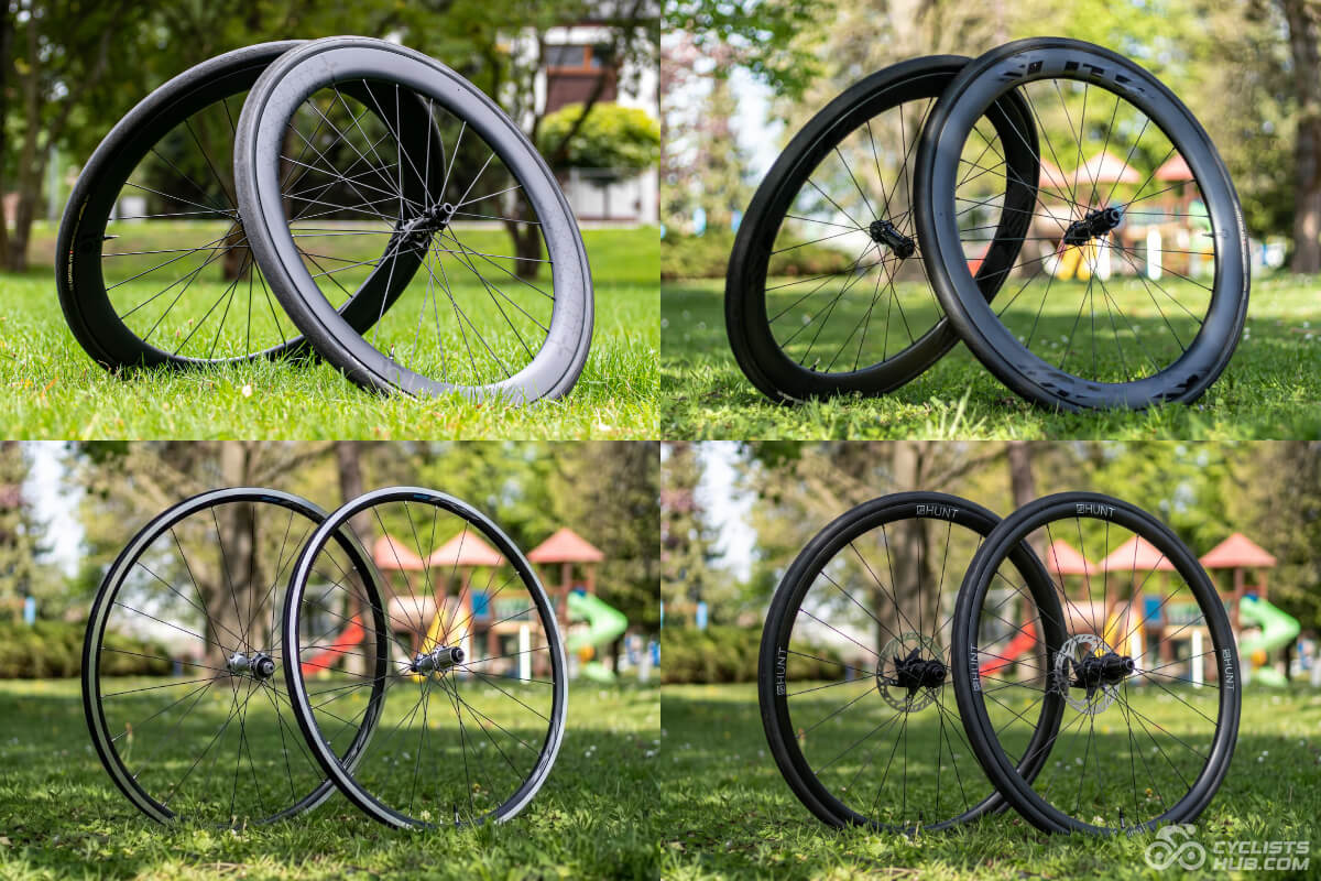 Best budget road bike wheels: Several budget carbon wheels shot in a park.