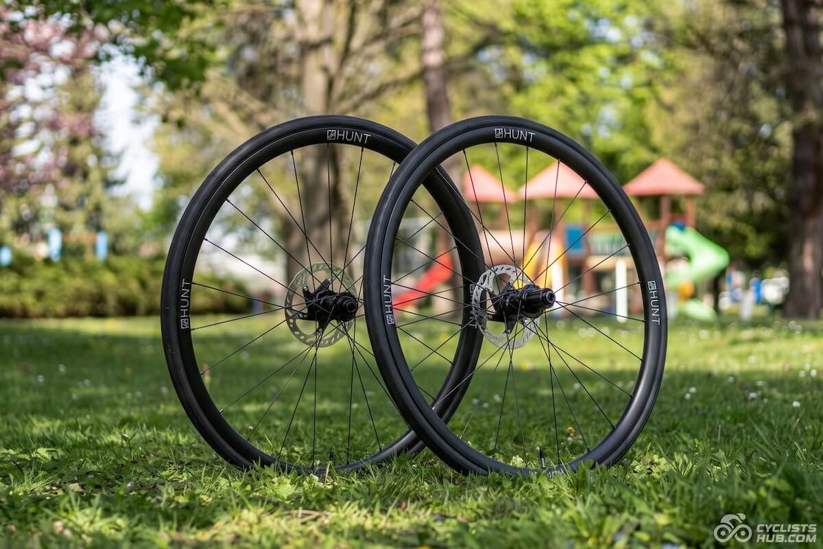 HUNT 4 Season All-Road disc wheels in a park.