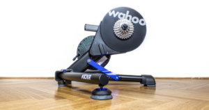Wahoo KICKR v5 review: KICKR v5 from the right side on a wooden floor and white background.