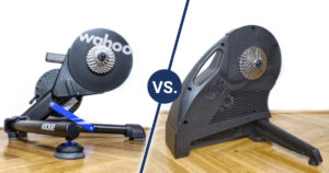 Wahoo KICKR v5 on the left side vs. Saris H3 on the right side (both on a wooden floor).