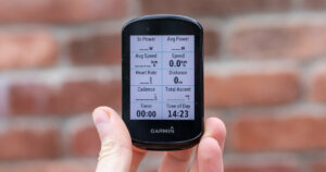Garmin Edge 830 review: Me holding the Garmin Edge 830, showing the front side.
