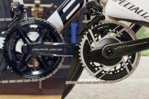 Shimano Dura-Ace Di2 groupset (left side) vs. SRAM RED eTap AXS groupset (right side).