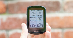 Garmin Edge 540 Solar review: Me holding the Garmin Edge 540 Solar showing its display.