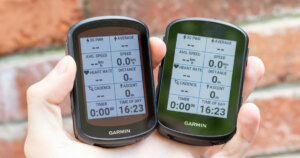 Me holding the Garmin Edge 540 Solar and 840 showing their front side.