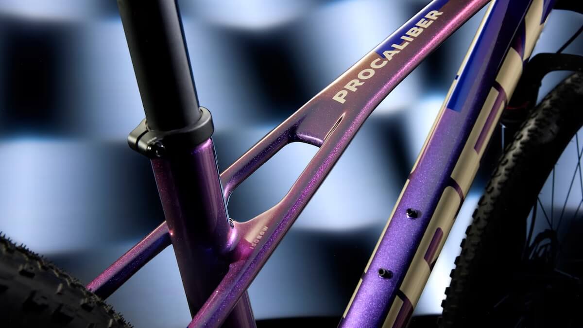 A detailed picture of the Trek IsoBow technology on a purple Trek Procaliber.