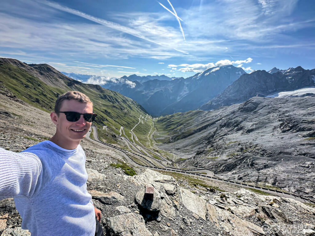 Me with the view from the Passo dello Stelvio (close to the Piz da las Trais Linguas).