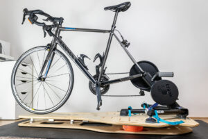 Rockito Rocker Plate review: My Canyon Endurance AL road bike mounted in Wahoo KICKR 5 and placed on Rockito Rocker Plate.