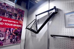 Winspace SLC 3.0 frame on a wall at Winspace booth (Eurobike 2024).