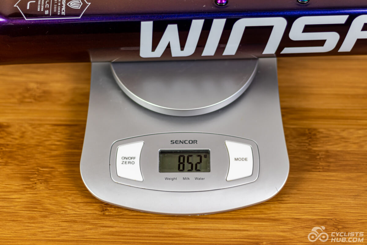 Winspace SLC5 L frame on a kitchen scale weighing 852g.