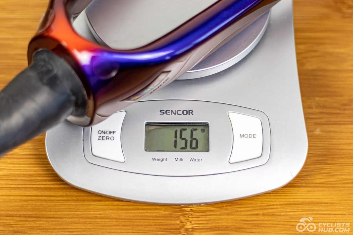 Winspace SLC5 fork on a kitchen scale weighing 156g.