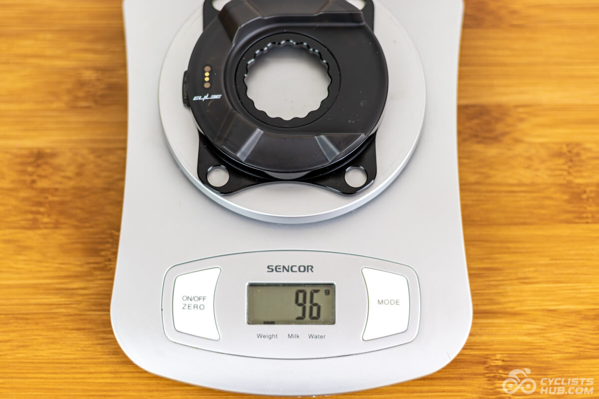 Elilee EK01 power meter on a kitchen scale showing weight of 96g.