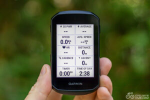 Garmin Edge 550 review: Me holding the Garmin Edge 550, showing its front side.