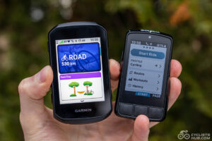 Me holding the Garmin Edge 550 vs. Wahoo ELEMNT BOLT 3.