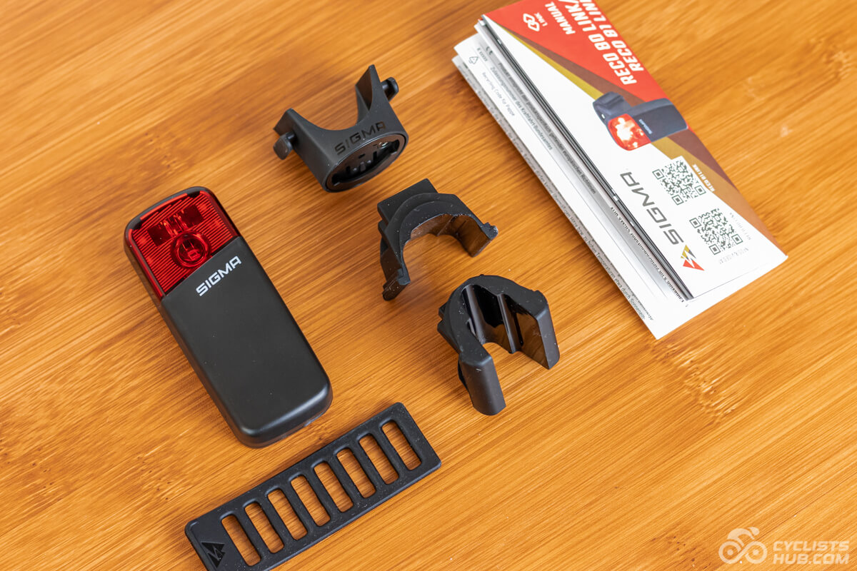 Sigma RECO 81 box contents on a wooden table.