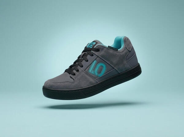 Grey FiveTen Freerider on a blue-ish background.