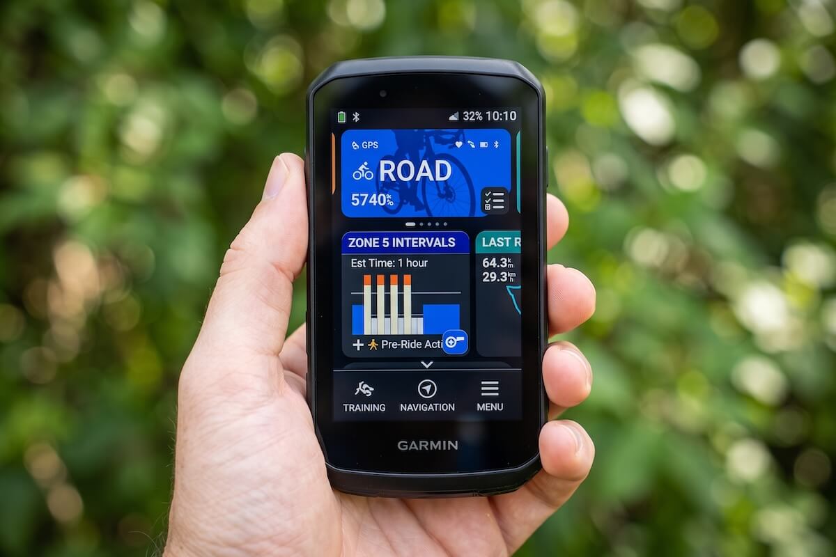 Garmin Edge 1060 Introduced: A person holding the Edge 1060 in his hand.