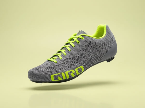 Gray and neon yellow Giro Empire E70 Knit road cycling shoe with lace-up closure, side view.