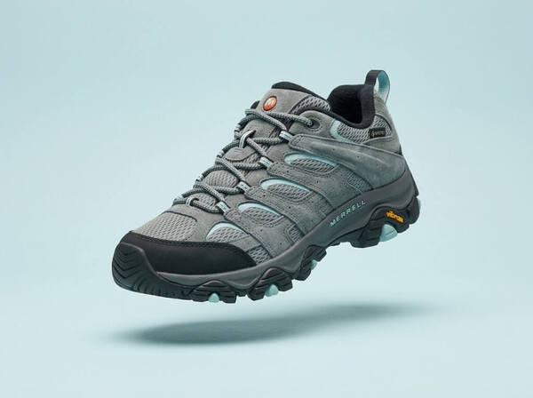 Merrell Moab 3 shoes on a blue-ish background.